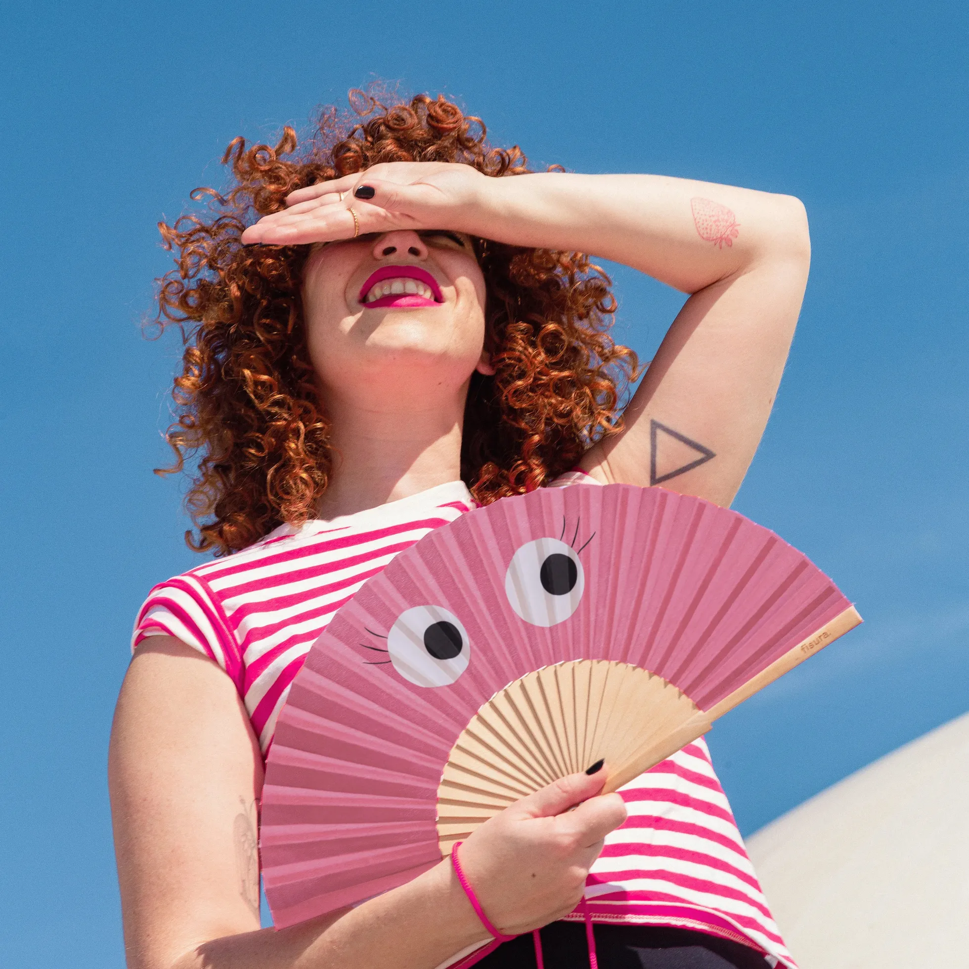 Abanico “Ojos” rosa