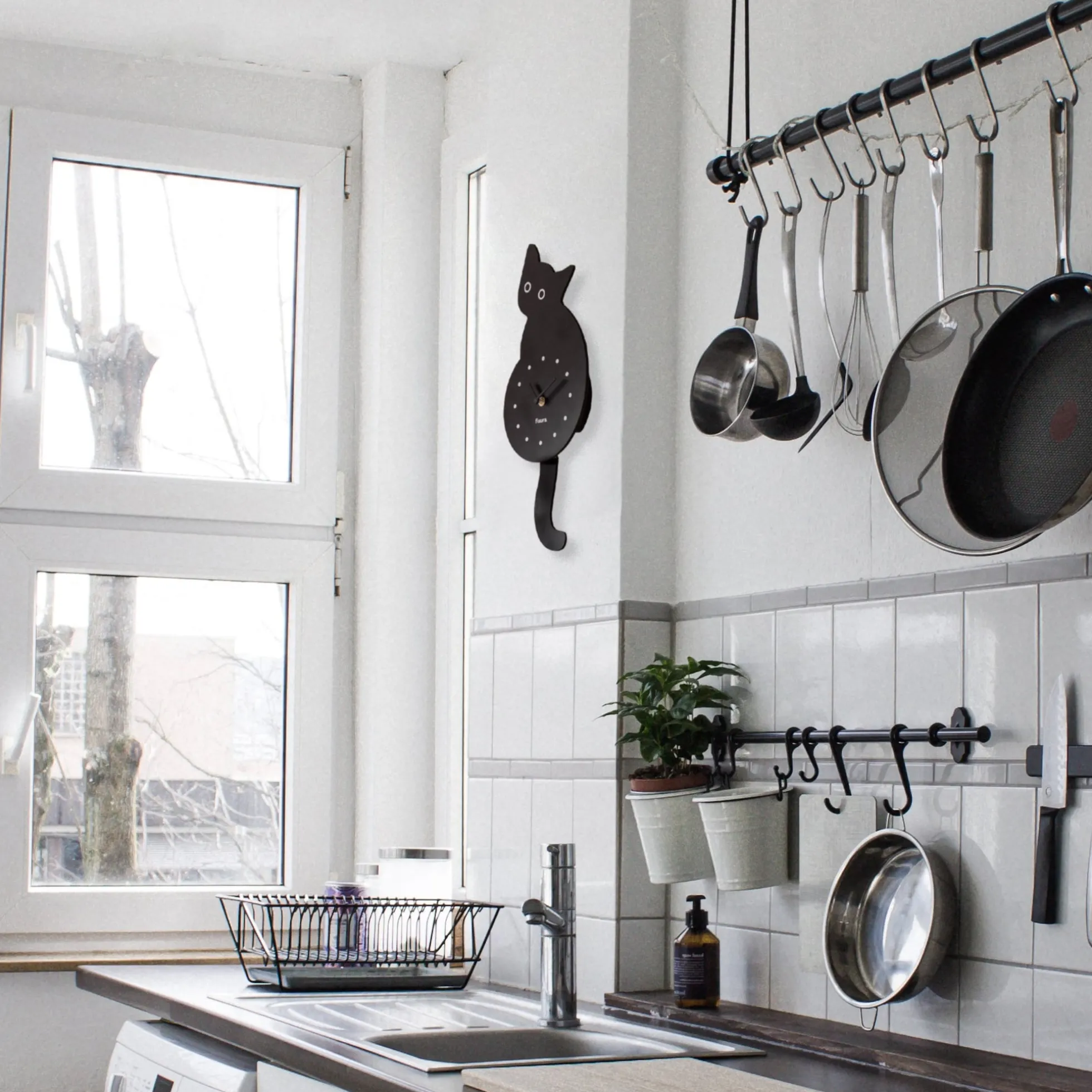 Reloj gato negro